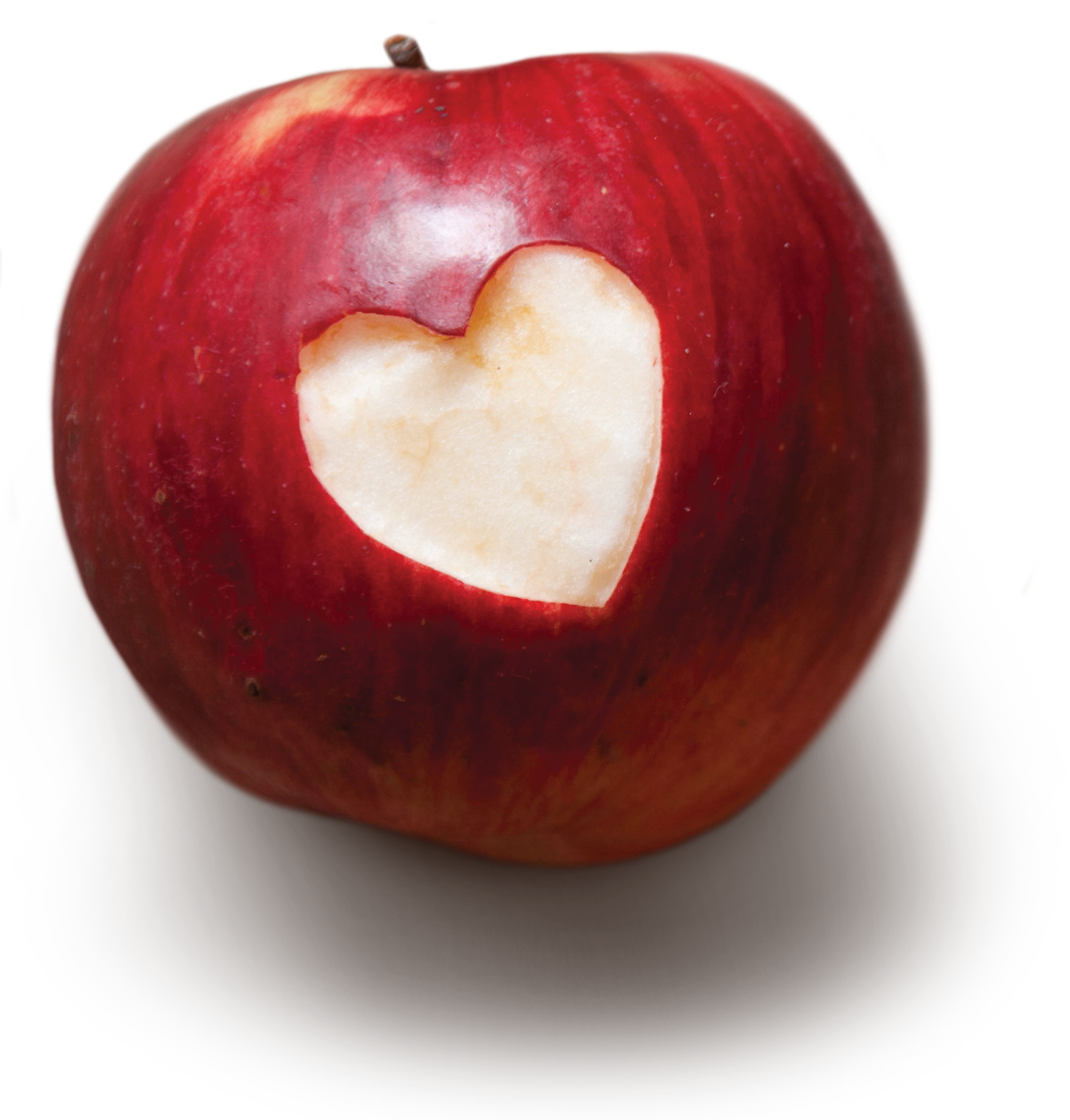 Red apple with a heart shaped hole in the skin.